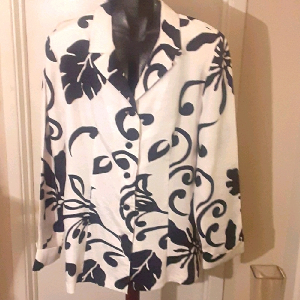 Black floral design on velvet white jacket
